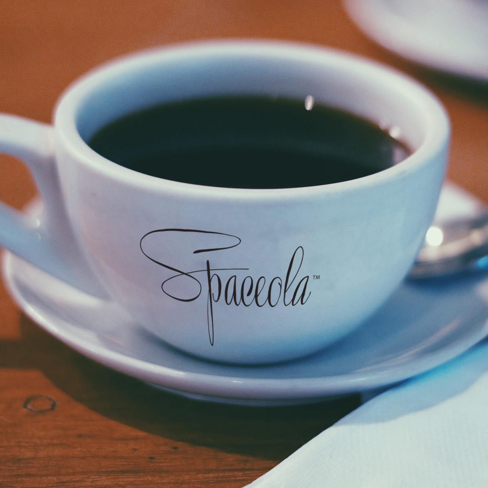 Attractive, high quality Spaceola coffee cup with Spaceola logo